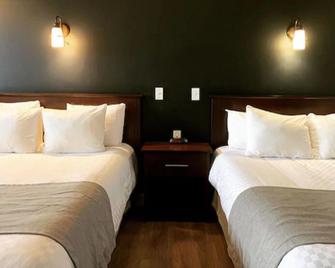 Hotel Marineau Centre - La Tuque - Bedroom