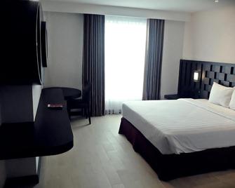 Grand Orchid Hotel Yogyakarta - Depok - Habitación