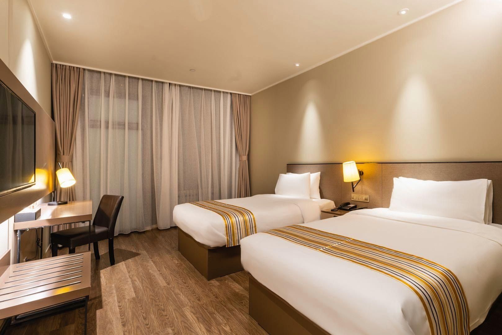 Home Inn Plus Harbin Central Street - هاربين - غرفة نوم