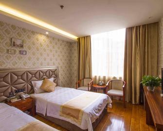 Luzhou Qianye Hotel - Luzhou - Habitación