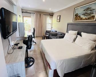 Highlands Lodges and Apartments - Harare - Schlafzimmer