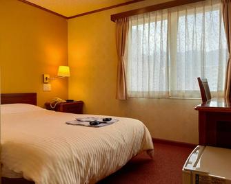 Beppu Station Hotel - Beppu - Bedroom