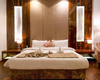 Hotel 5 Flowers Ananta Elite - Kota - Bedroom