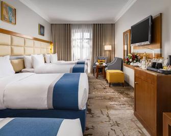 Emaar Elite Al Madina Hotel - Medina - Bedroom