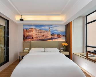 Vienna Hotel Puning South Huancheng Road High-Speed Train Station - Jieyang - Camera da letto