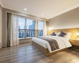 Qingjiang Hotel (Yichang Cbd) - Yichang - Bedroom