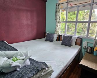 Cafe and Stay - Darjeeling - Soveværelse