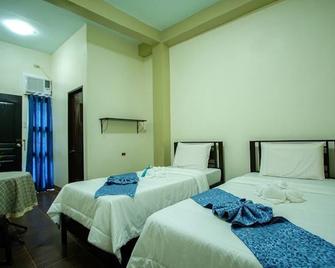 Casavecino - Daraga - Camera da letto