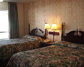 Red Carpet Inn - Wall - Sovrum