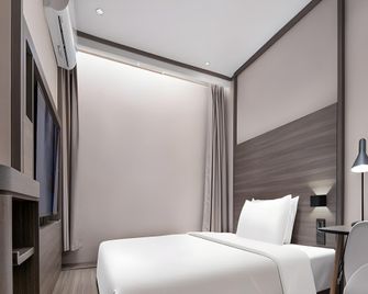 Hanting Hotel Changsha Xiangya Fu'er Ziyuan Road - Changsha - Habitación