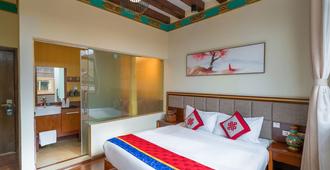 ボーデイ ブティック イン - デチェン・チベット族自治州 - 寝室