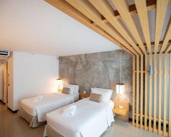 Nimman Mai Design Hotel Chiang Mai - צ'אנג מאי - חדר שינה