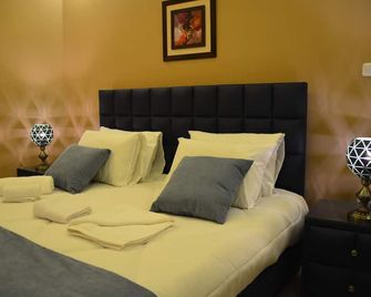 Sama Amman Hotel Apartments - Amman - Schlafzimmer