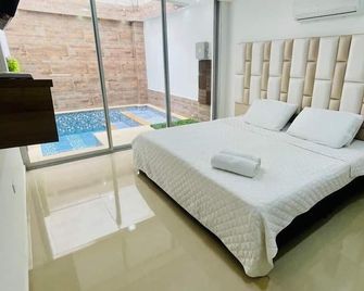 Hotel Paraiso Salvaje - Leticia - Ložnice