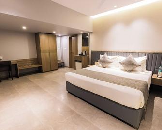 The Augusta Club & Resort - Surat - Habitación