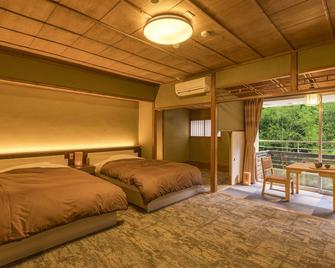 Ooedo Onsen Monogatari Premium Yoshinoya Irokuen - Kaga - Bedroom