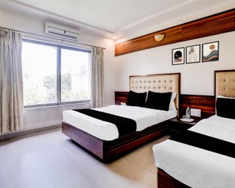 Hotel O The Satyan Inn - Shirdi - Ložnice