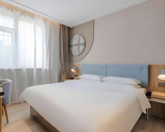 Homeinn Hotel (Wuhu Development Zone Baixian Plaza) - Wuhu - Habitación