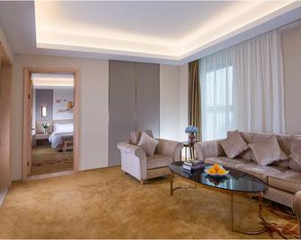 Vienna Hotel Zhejiang Huzhou Changxing Mingzhu Road - Huzhou - Living room