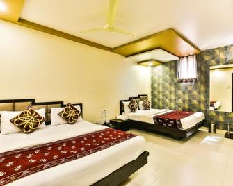 Guest Inn Hospitality - Mumbai - Slaapkamer