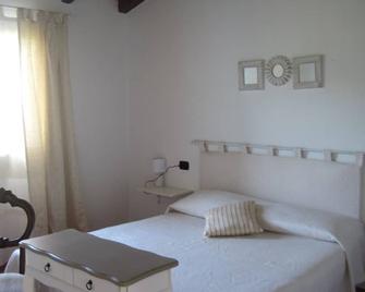 Vrbo Property - Monte Petrosu - Bedroom