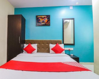 OYO 47586 J J Residency - Bargarh - Bedroom