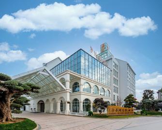 Narada Resort Shanghai Hotel Disney Store - שנחאי - בניין