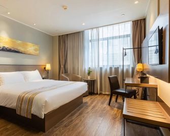 Home Inn Plus Changzhou Dinosaur Park Wanda Plaza - Čchang-čou - Ložnice