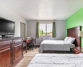 Super Inn By OYO Lansing MI - Lansing - Schlafzimmer