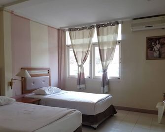 Casa Holiday Hotel - Phitsanulok - Bedroom