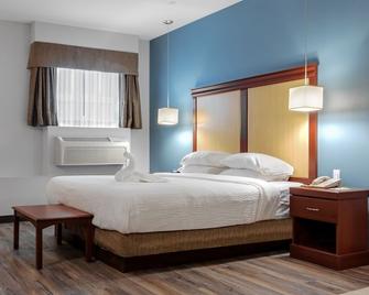 Premier Inn & Suites - Downtown Hamilton - 해밀턴 - 침실