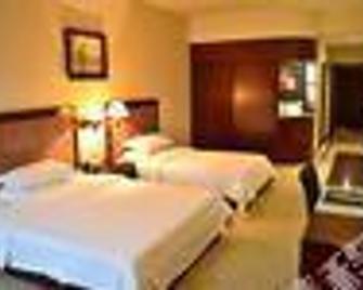 Ocean City Hotel - Shaoguan - Bedroom
