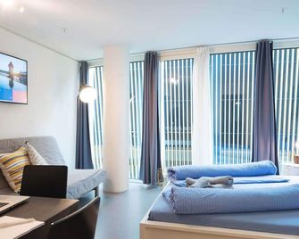 Lu Bourbaki I - Allmend Hitrental Apartment - Luzern - Wohnzimmer