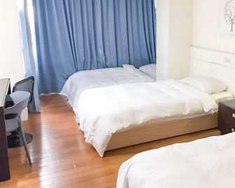 Fudi hotel - Taichung City - Bedroom