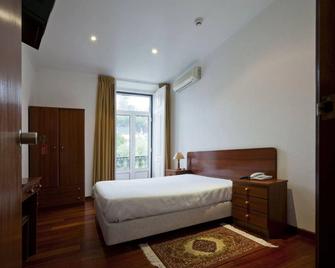 Hotel Portuense - Lissabon - Schlafzimmer
