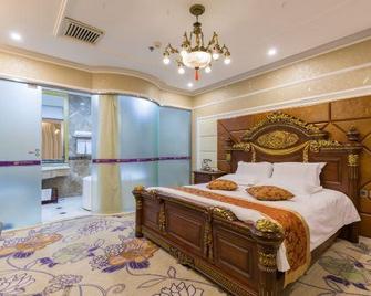 Beijing Dajiaoting International Business Hotel - Peking - Slaapkamer
