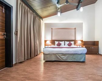 Treebo Five Elements with Swimming Pool - Lonavala - Camera da letto
