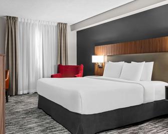 Country Inn & Suites by Radisson, Winnipeg, MB - וויניפג - חדר שינה