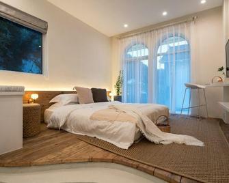 Hangzhou Highland Barley Garden Hostel - Hangzhou - Schlafzimmer
