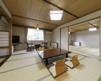 Hotel White Inn Kitashiga - Yamanouchi - Phòng ngủ
