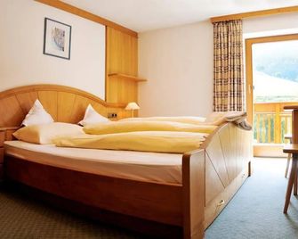 Hotel Torgglerhof - Bressanone/Brixen - חדר שינה