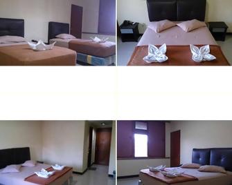Quint Hotel - Manado - Habitación