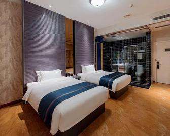 Shanghai Changxing Hotel - Xuzhou - Bedroom