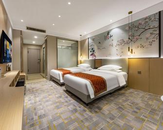 New Shanghai International Hotel - Shijiazhuang - Bedroom