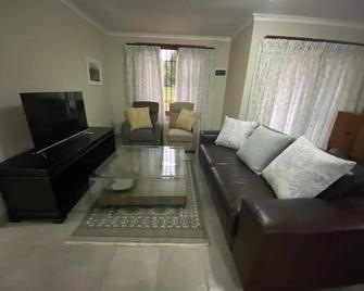 Man and Dog Log Cabin - Midrand