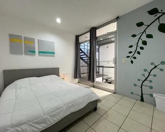 Sjo Oasis Hostel - San José - Phòng ngủ