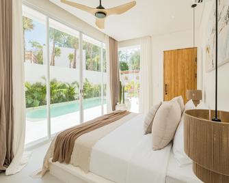 Mazari Villas - Denpasar - Schlafzimmer