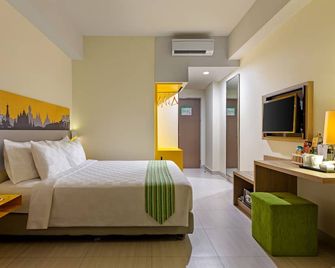 خاص ماليوبورو - يوغياخيرتا - غرفة نوم