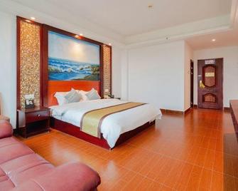 Dong´ao Impression Style Hotel - Wanning - Bedroom