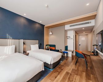 Holiday Inn Express Taizhou Cmc By IHG - Taizhou - Slaapkamer
